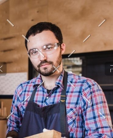 demo-attachment-294-young-craftsman-in-uniform-working-at-carpentry-PL7Q9UL